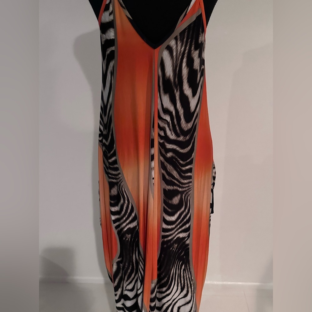 Animal print maxi dress with pockets.
